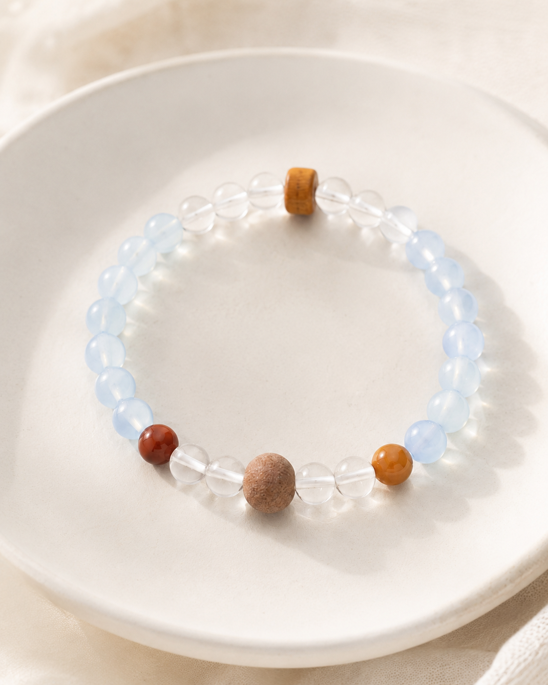 Aquamarine and clear quartz bracelet styled with natural crystal details